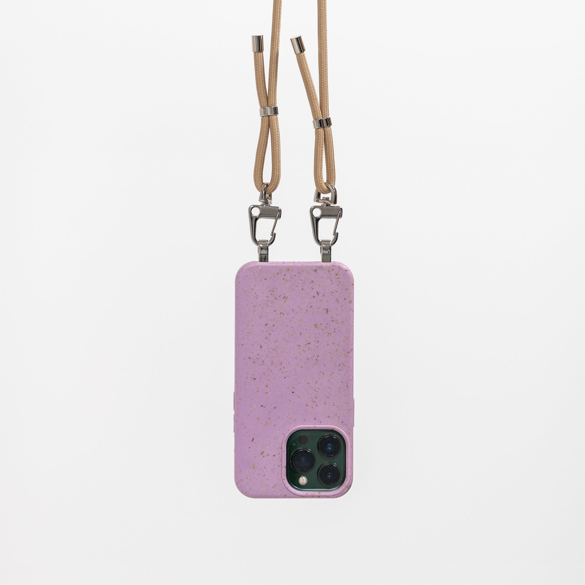 Lavender Loop crossbody phone case hanging with tapioca crossbody cord attached