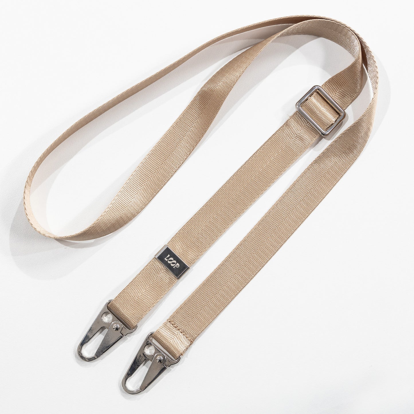 Latte crossbody phone strap lay flat with no phone case attached